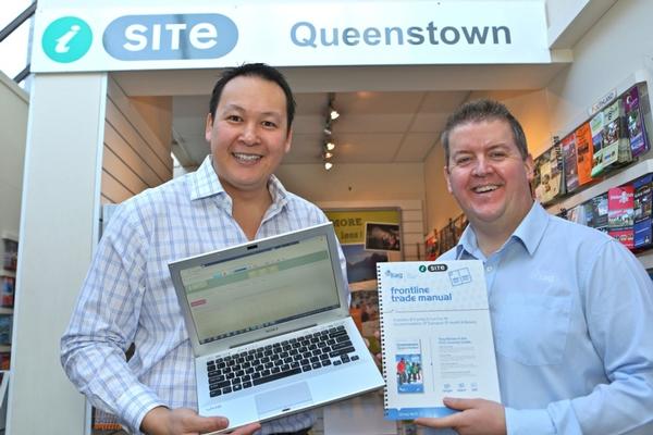 i-SITE Queenstown General Manager Matt Wong with iTAG Regional Manager Steve Hanrahan.  